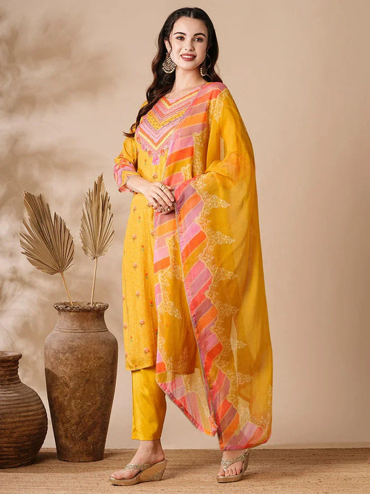 Woman wearing yellow and pink pure cotton kurta set with dupatta, ethnic wear for women