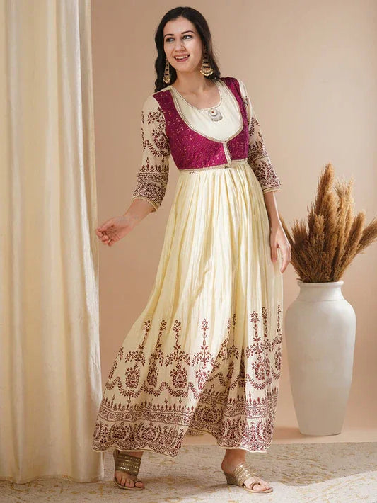 Woman wearing cream and maroon embroidered cotton kurta dress, ethnic wear for women